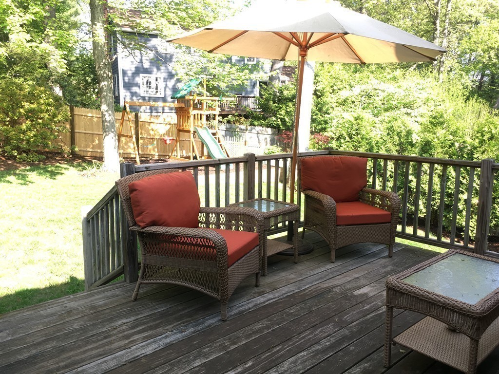12 Kent Road Needham, MA 02492 - Photo 13 of 20 a balcony with furniture and wooden floor