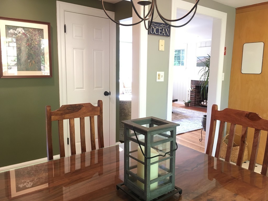 12 Kent Road Needham, MA 02492 - Photo 8 of 20 a view of a hallway with furniture and windows