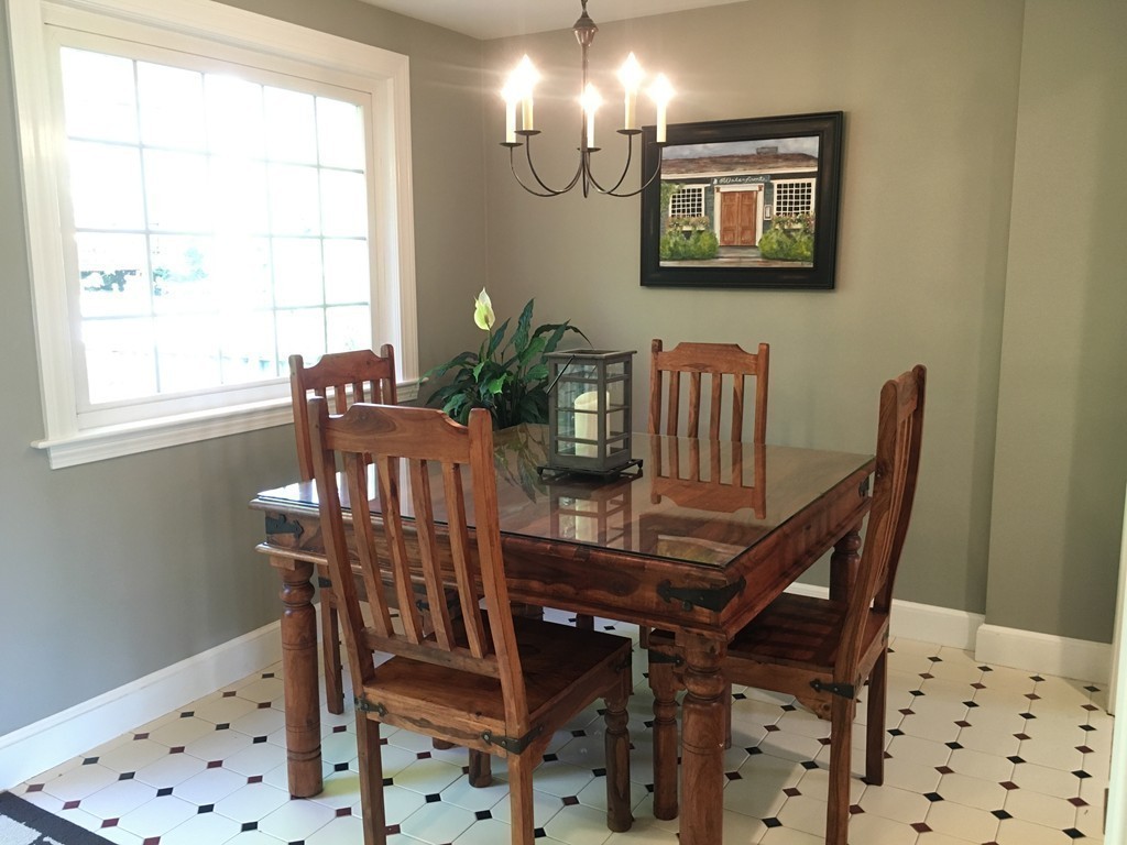 12 Kent Road Needham, MA 02492 - Photo 9 of 20 a view of a dining room with furniture and chandelier