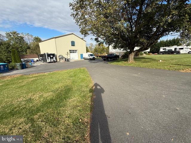 65 Campbell Road York, PA 17406 - Photo 1 of 61 a view of outdoor space with garden view