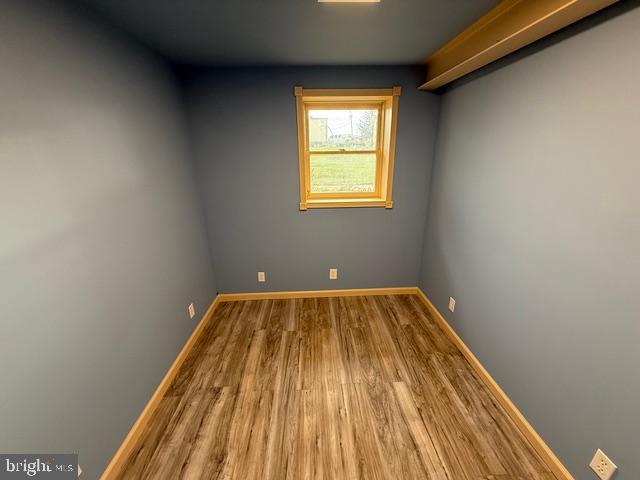 65 Campbell Road York, PA 17406 - Photo 23 of 61 a view of a room with wooden floor and window