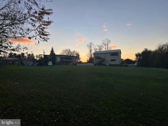 65 Campbell Road York, PA 17406 - Photo 26 of 61 a backyard of a house with lots of green space