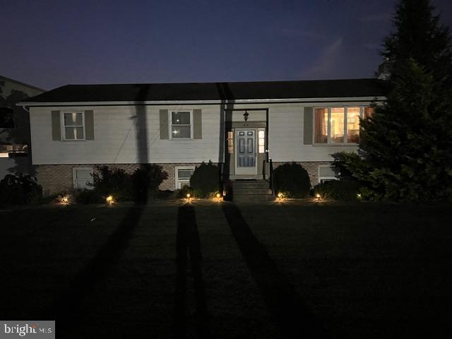 65 Campbell Road York, PA 17406 - Photo 4 of 61 a front view of a house with a yard