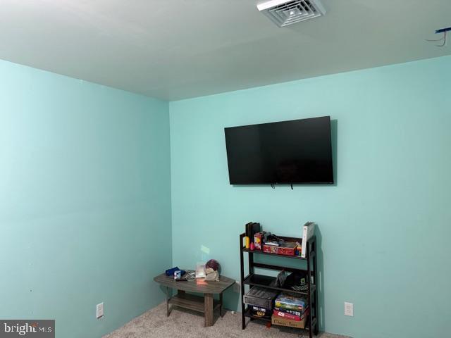 65 Campbell Road York, PA 17406 - Photo 54 of 61 a living room with furniture and a flat screen tv