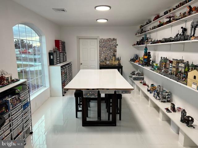 65 Campbell Road York, PA 17406 - Photo 58 of 61 a table and chairs in a room with kitchen area