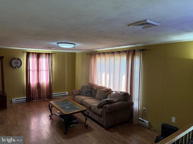 65 Campbell Road York, PA 17406 - Photo 8 of 61 a living room with furniture and a window