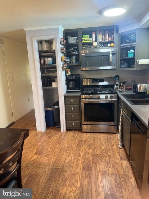65 Campbell Road York, PA 17406 - Photo 9 of 61 a kitchen with stainless steel appliances granite countertop a stove and a refrigerator