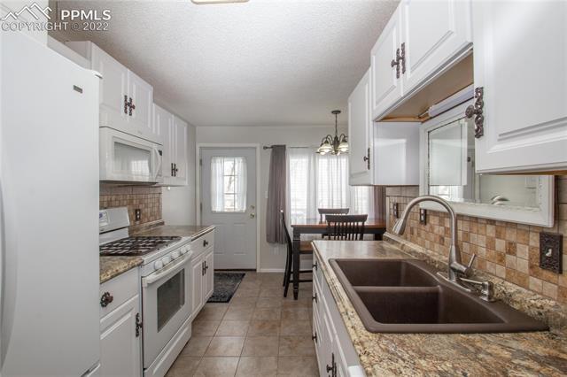 3230 Corral Ranch Road Peyton, CO 80831 - Photo 13 of 21 Gallery Image 13