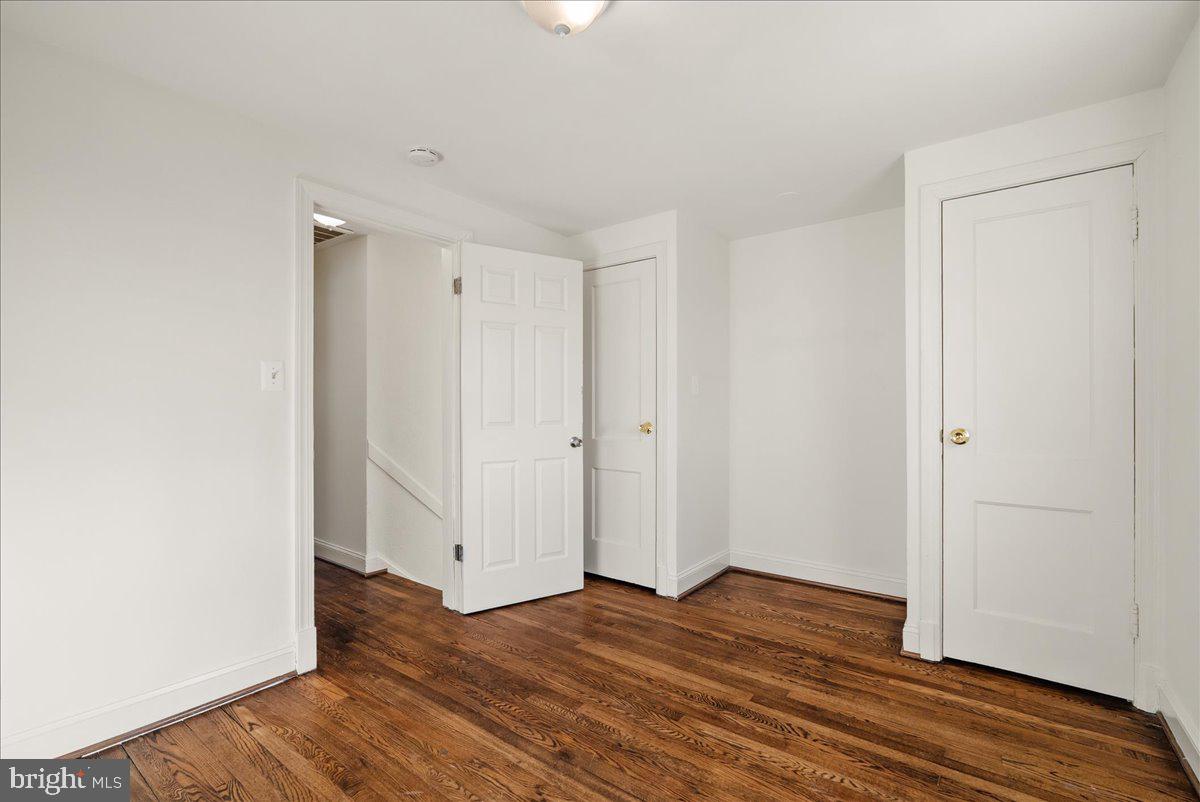 6416 Blair Road Northwest Washington, DC 20012 - Photo 14 of 32 a view of empty room with wooden floor