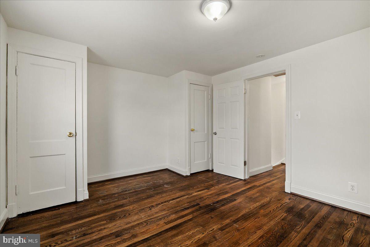 6416 Blair Road Northwest Washington, DC 20012 - Photo 19 of 32 a view of a room with wooden floor