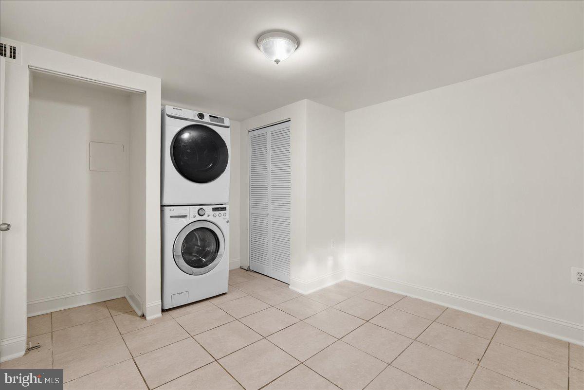 6416 Blair Road Northwest Washington, DC 20012 - Photo 25 of 32 a view of a storage & utility room with a washer dryer