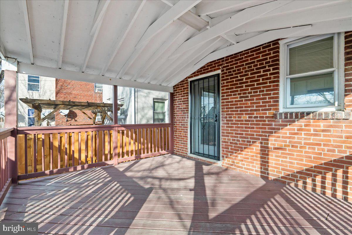 6416 Blair Road Northwest Washington, DC 20012 - Photo 26 of 32 a balcony with wooden floor
