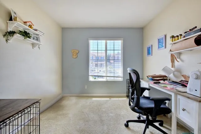 a bathroom with a sink toilet and mirror