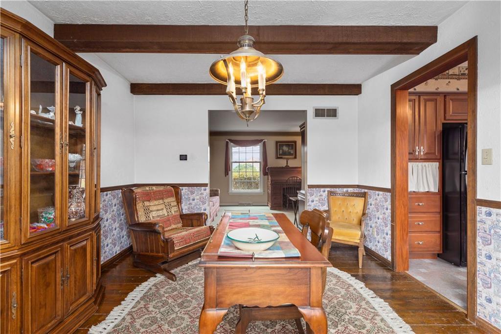 5895 Tuscarawas Road Beaver, PA 15009 - Photo 12 of 23 a living room with furniture and a chandelier