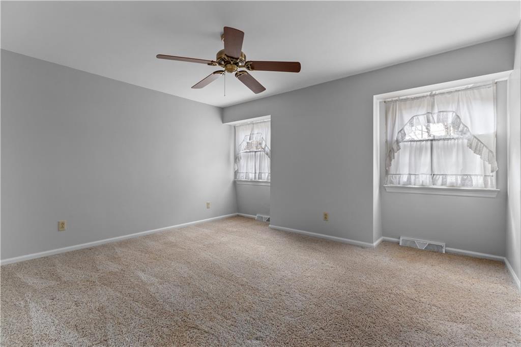 5895 Tuscarawas Road Beaver, PA 15009 - Photo 18 of 23 a view of an empty room with a window