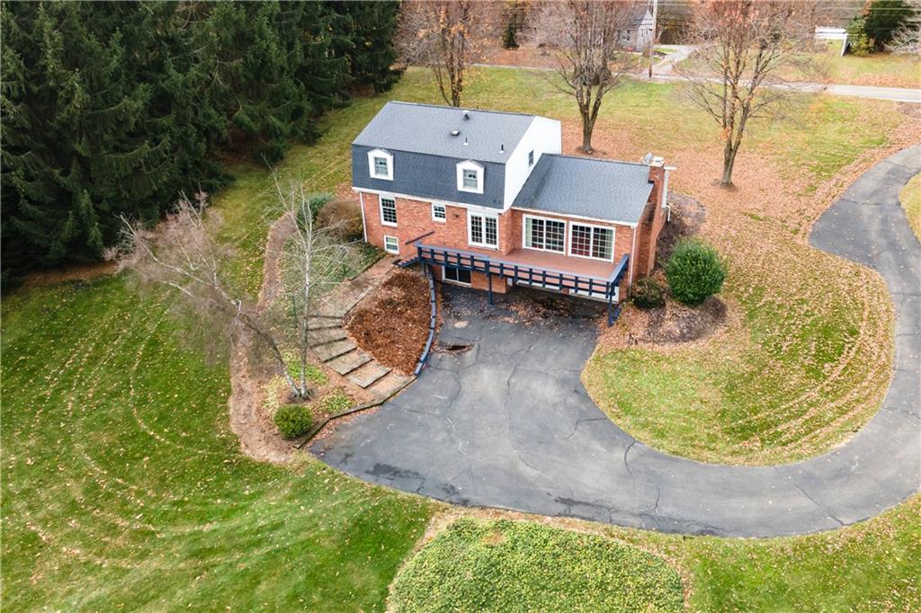 5895 Tuscarawas Road Beaver, PA 15009 - Photo 4 of 23 an aerial view of a house with a swimming pool
