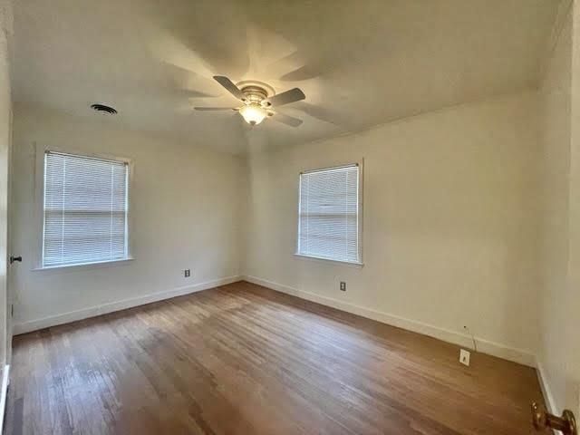 4691 Lynn Road Memphis, TN 38122 - Photo 11 of 12 a view of room with window ceiling fan and hardwood floor