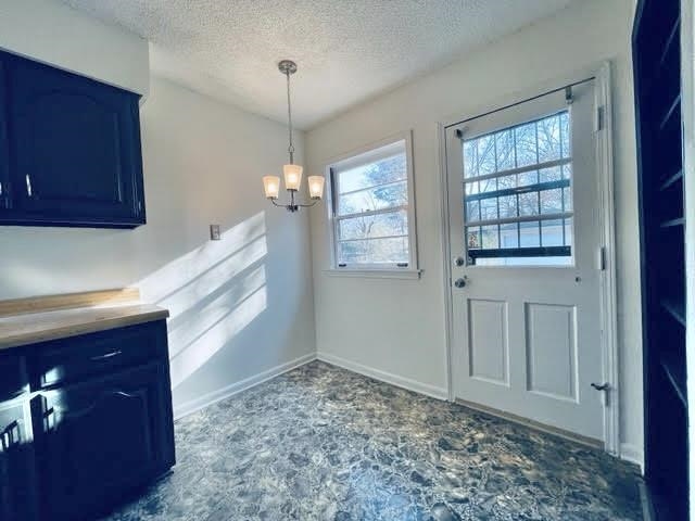 4691 Lynn Road Memphis, TN 38122 - Photo 4 of 12 a view of an empty room with a window