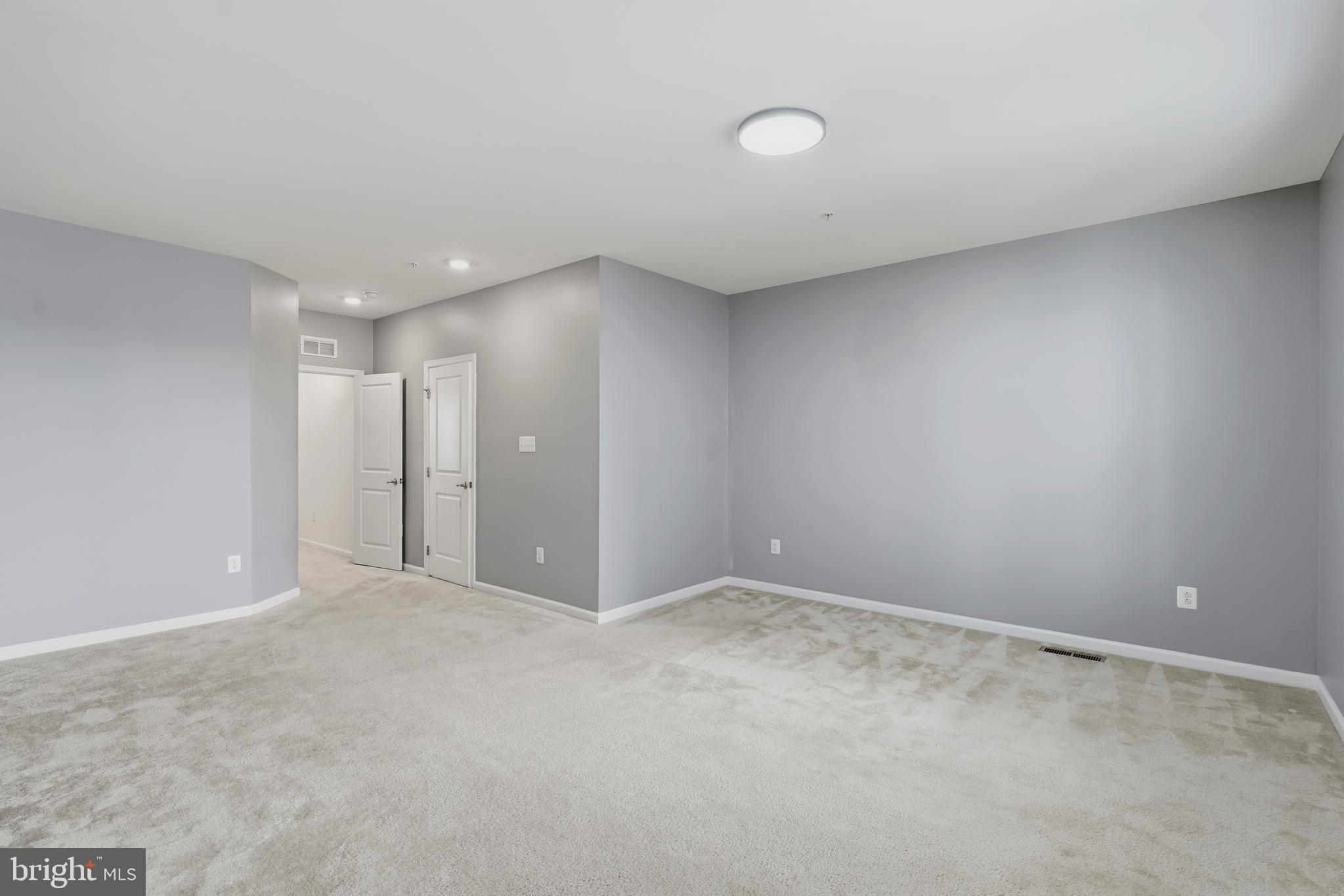 8021 Orchard Grove Road Odenton, MD 21113 - Photo 16 of 31 Spacious Primary Bedroom