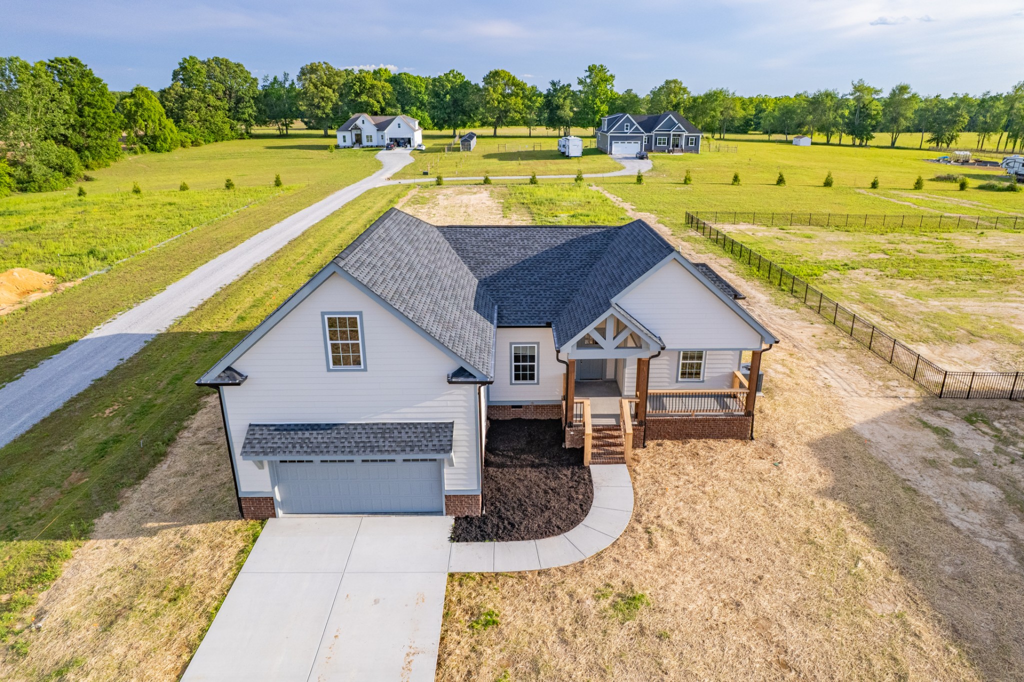 338 Dugout Road Summertown, TN 38483 - Photo 1 of 75 a view of a house with a swimming pool and a yard
