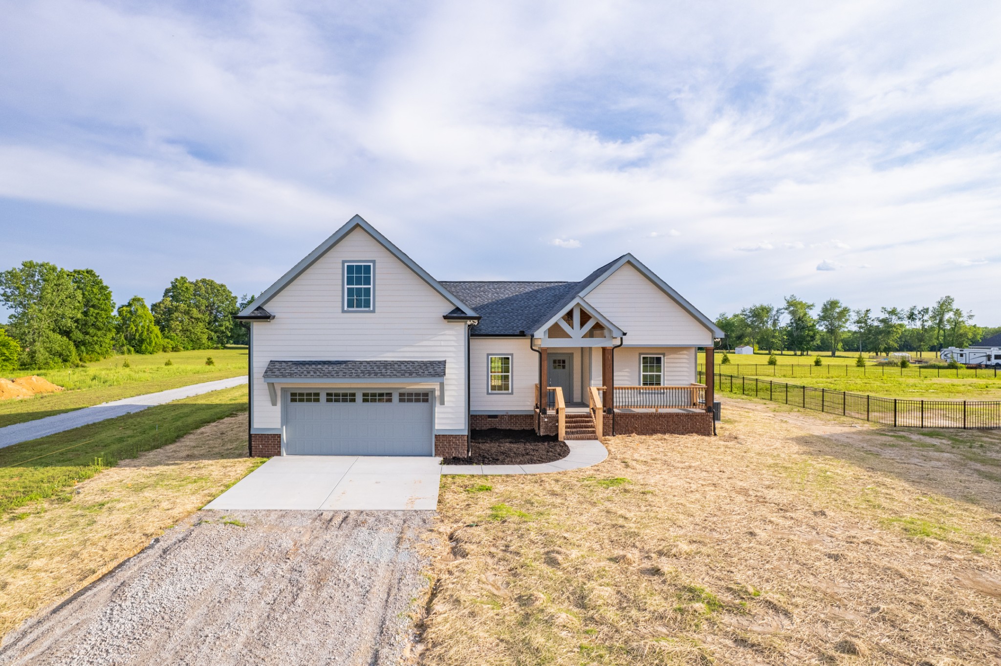 338 Dugout Road Summertown, TN 38483 - Photo 3 of 75 a view of a house with a yard and ocean view