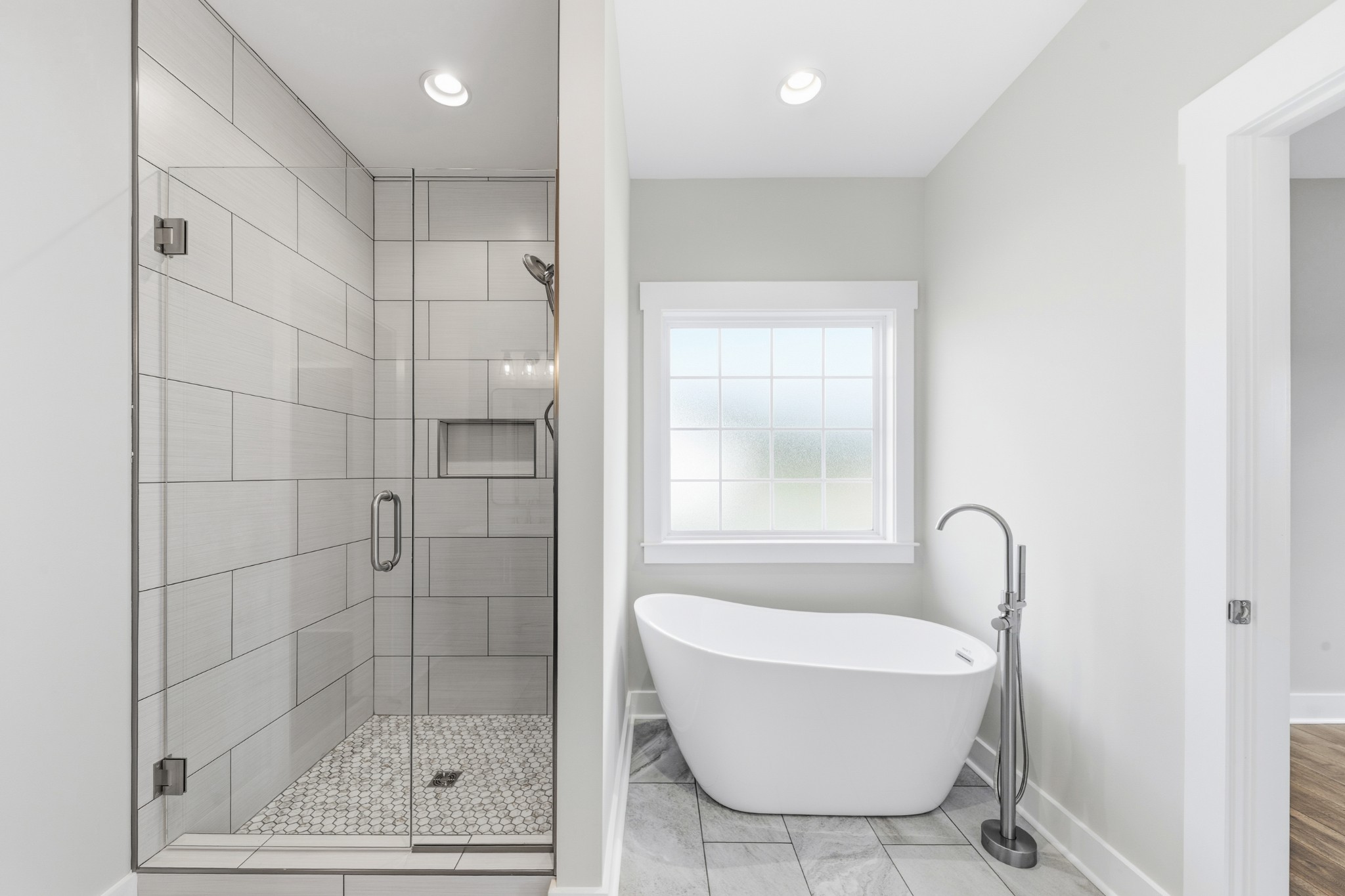 338 Dugout Road Summertown, TN 38483 - Photo 42 of 75 a bathroom with a bathtub and shower