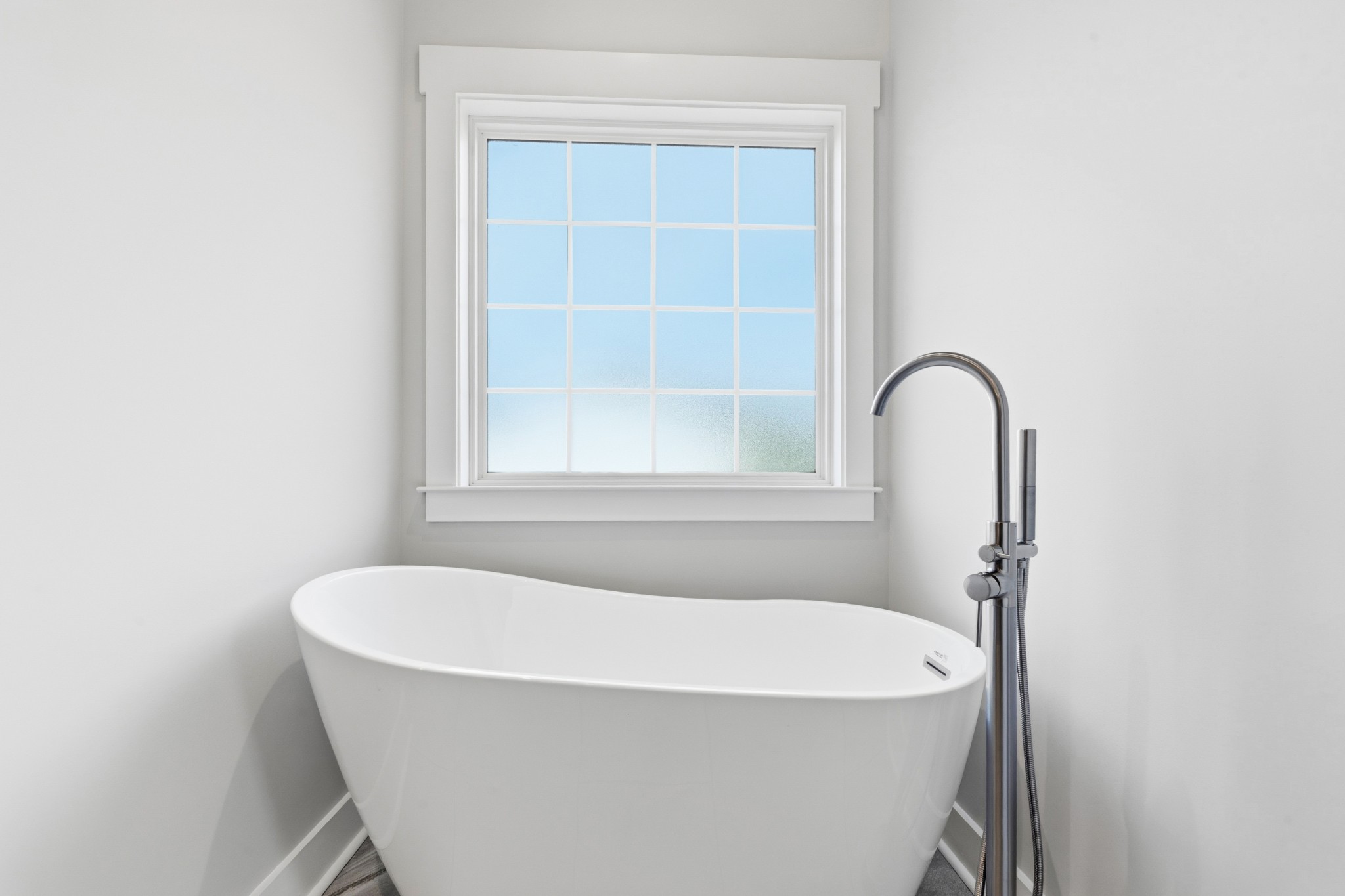 338 Dugout Road Summertown, TN 38483 - Photo 44 of 75 a white bath tub sitting next to a window