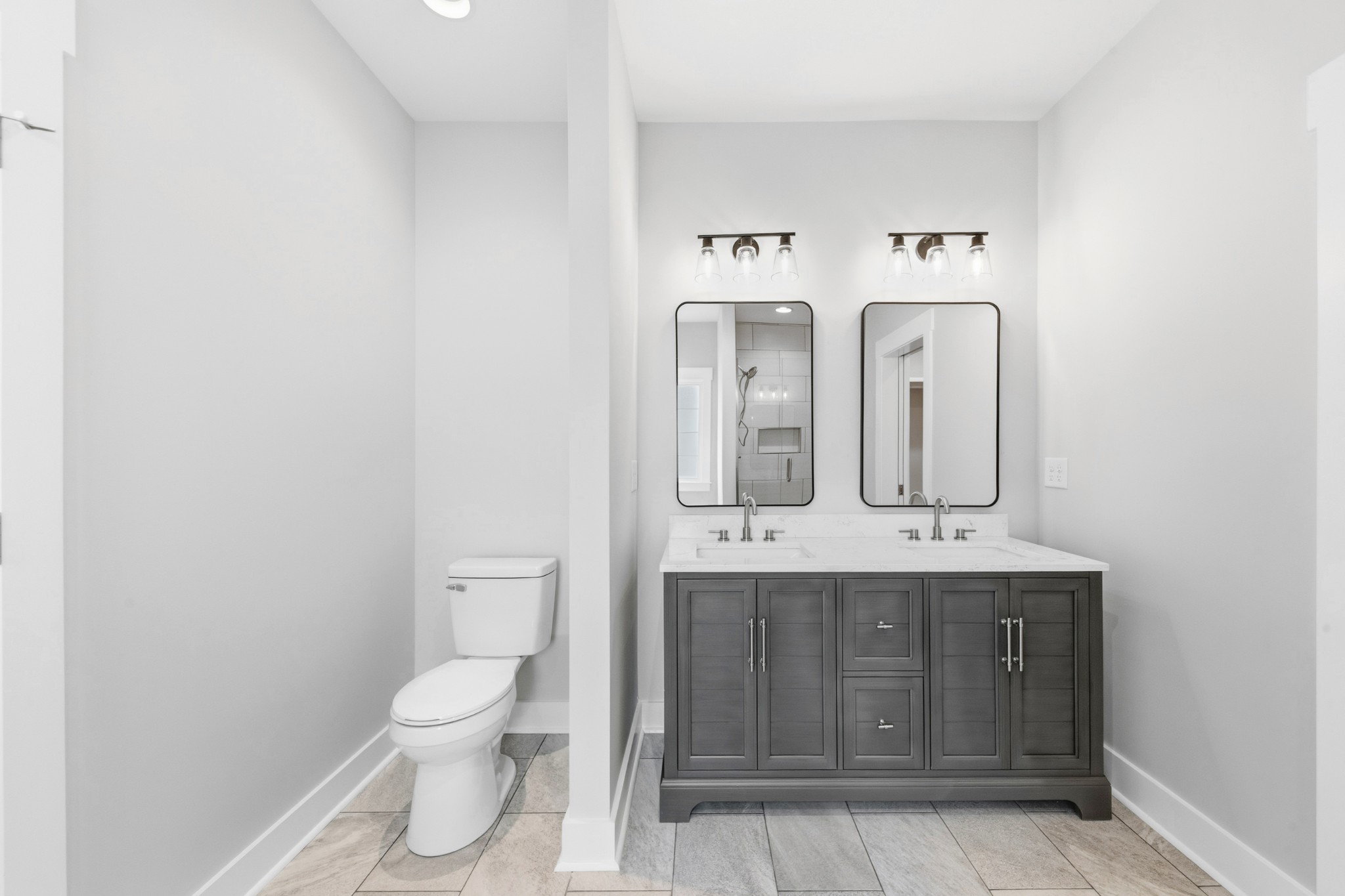 338 Dugout Road Summertown, TN 38483 - Photo 47 of 75 a bathroom with a toilet sink and mirror