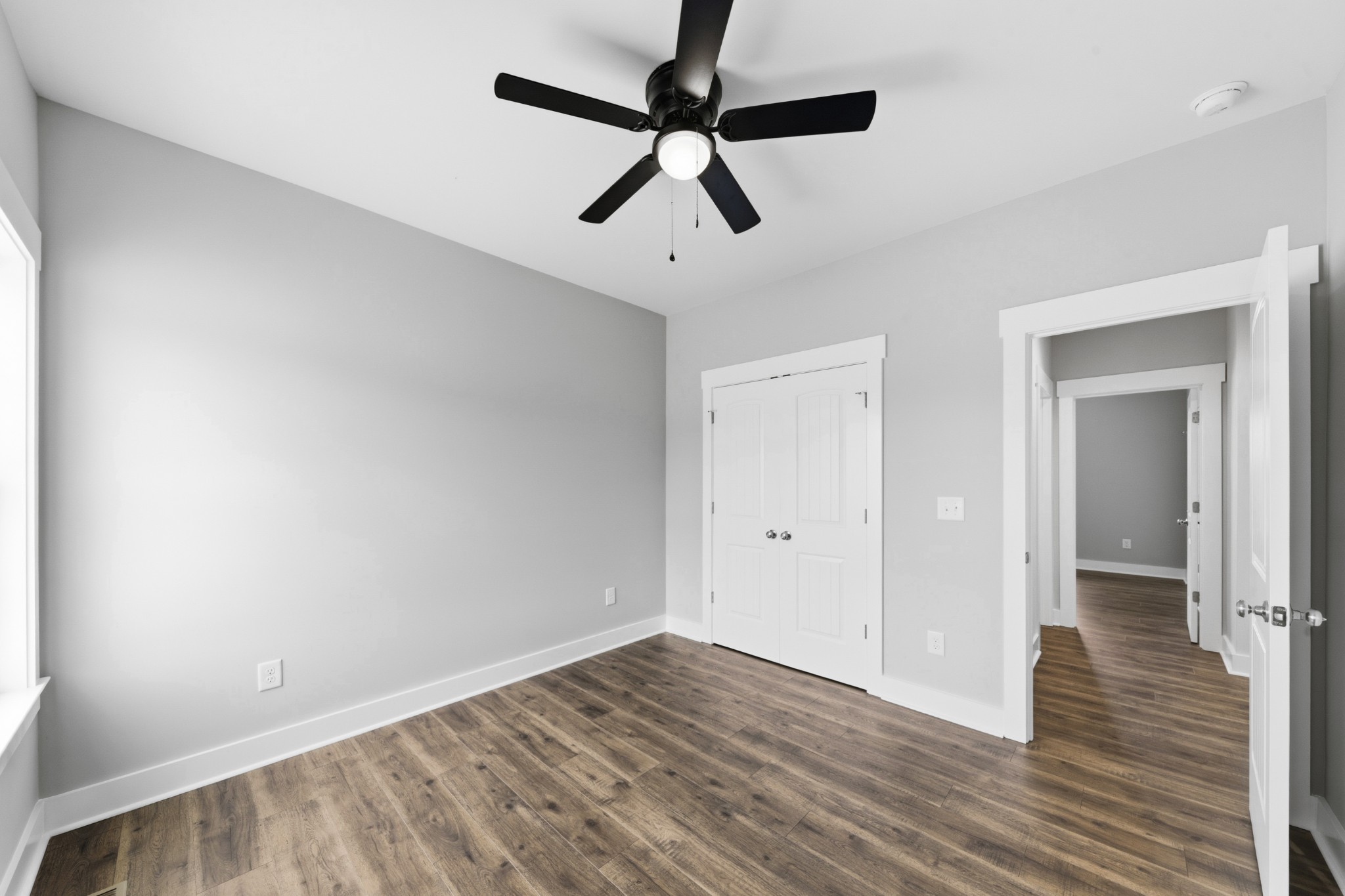 338 Dugout Road Summertown, TN 38483 - Photo 55 of 75 a view of room with wooden floor and ceiling fan