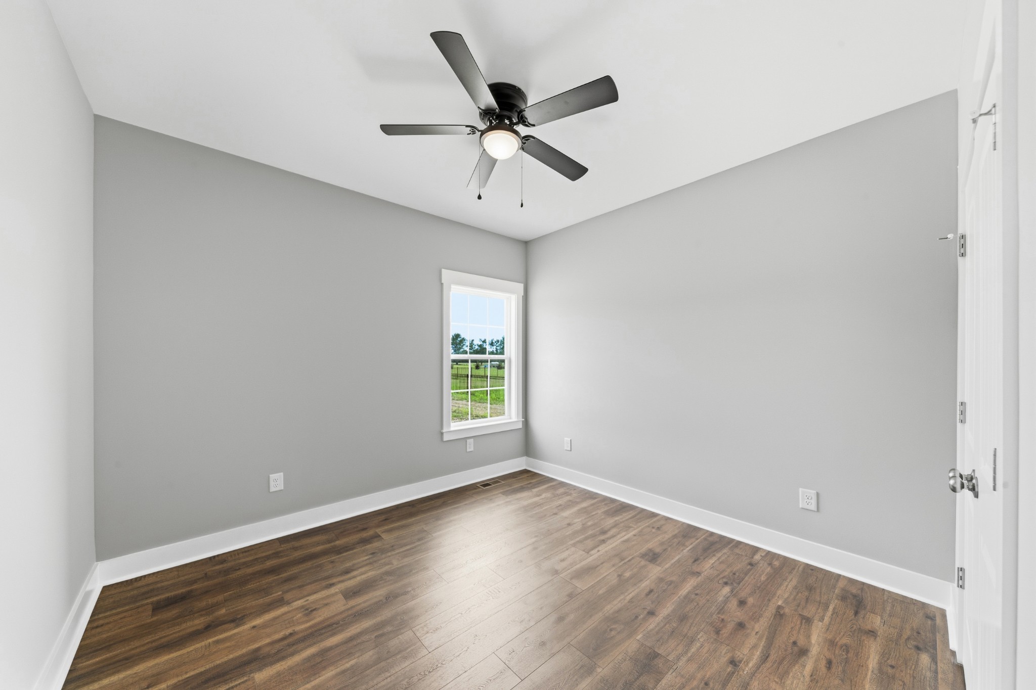 338 Dugout Road Summertown, TN 38483 - Photo 56 of 75 wooden floor in an empty room with a window