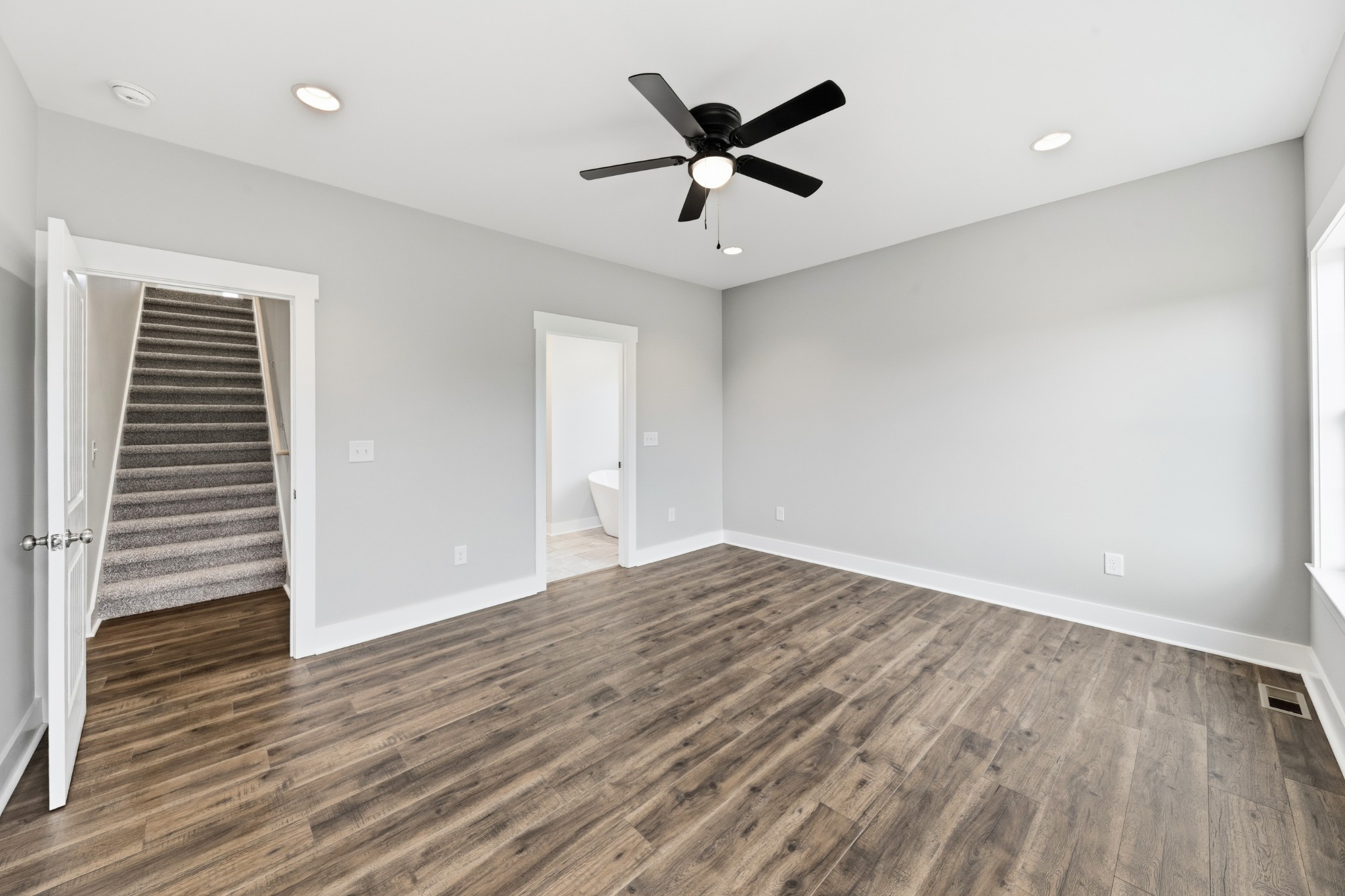 338 Dugout Road Summertown, TN 38483 - Photo 61 of 75 wooden floor in an empty room with a window