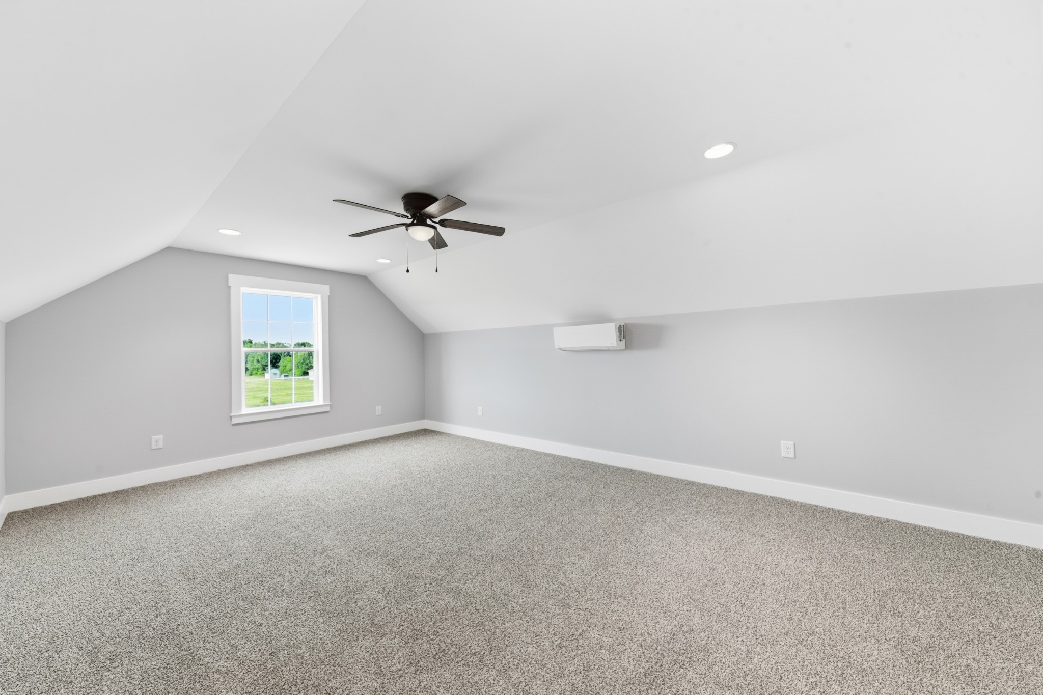 338 Dugout Road Summertown, TN 38483 - Photo 62 of 75 an empty room with windows and a ceiling fan
