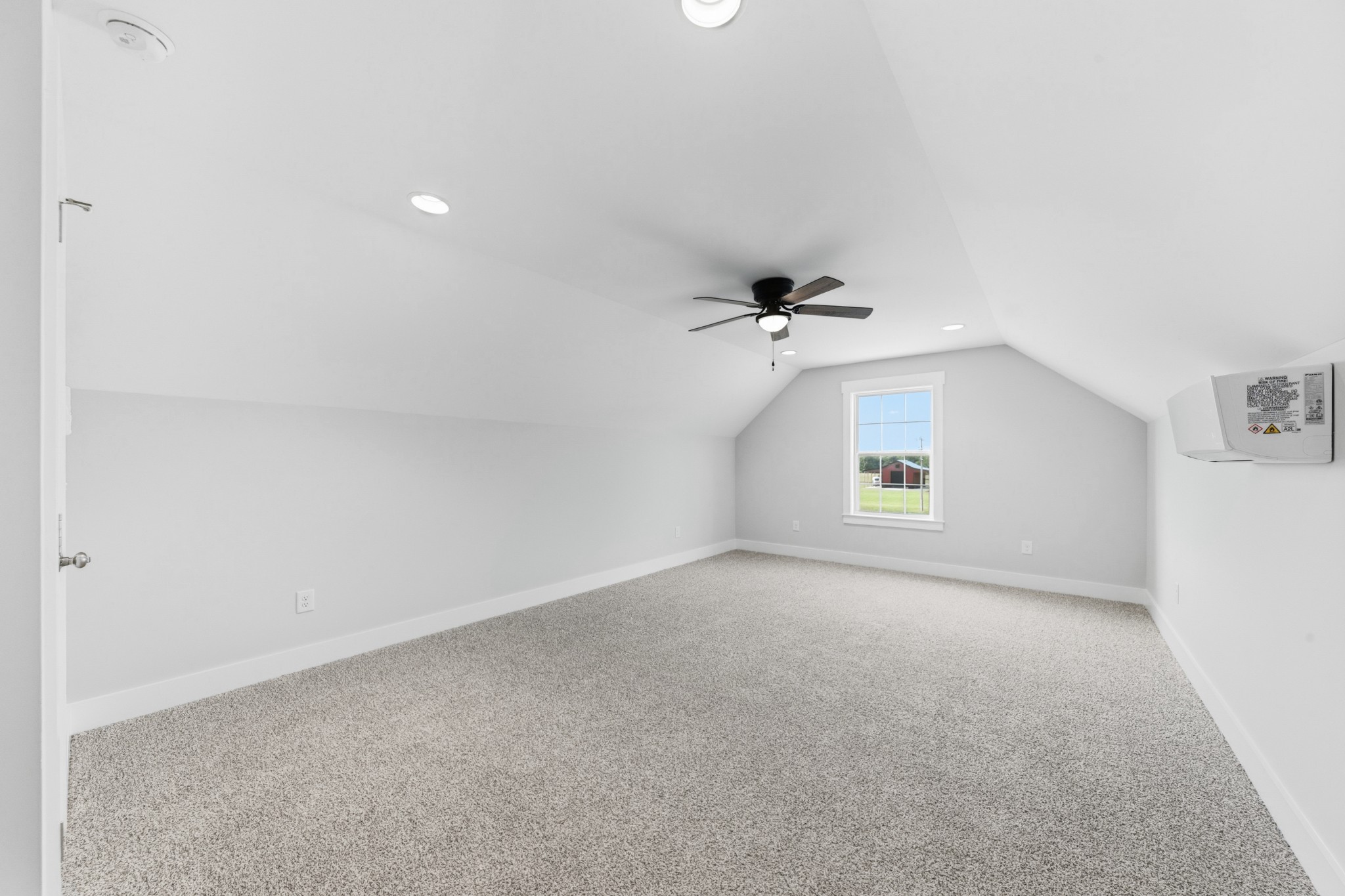 338 Dugout Road Summertown, TN 38483 - Photo 63 of 75 an empty room with a empty space and a ceiling fan