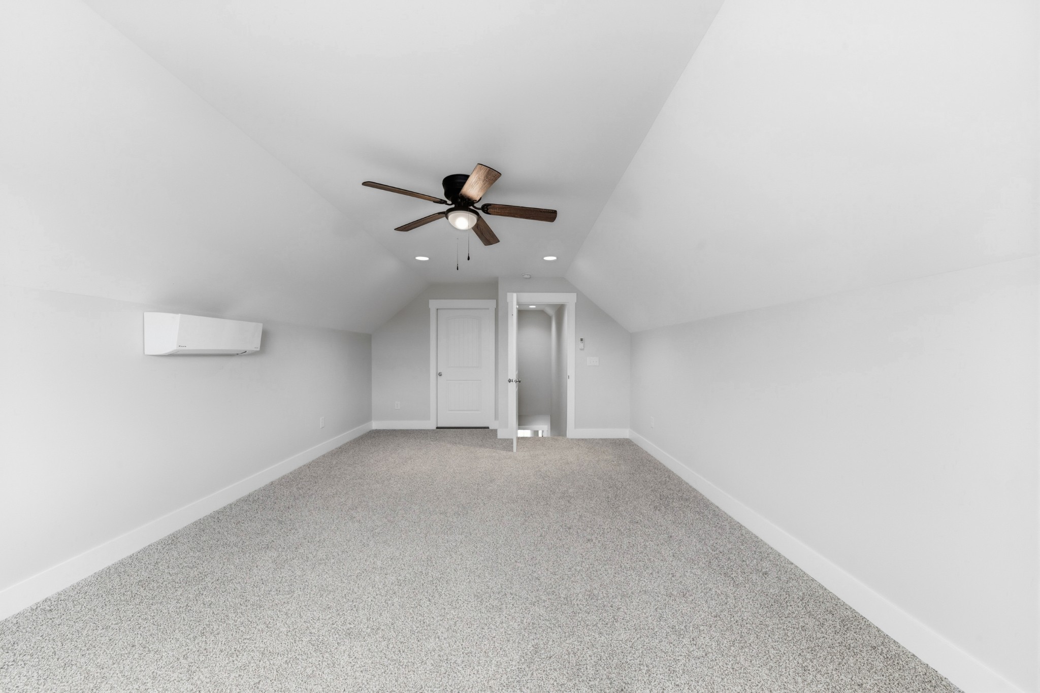 338 Dugout Road Summertown, TN 38483 - Photo 64 of 75 an empty room with a ceiling fan and carpet