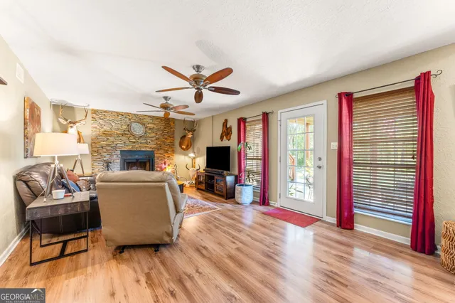 a kitchen with stainless steel appliances a refrigerator and a stove top oven