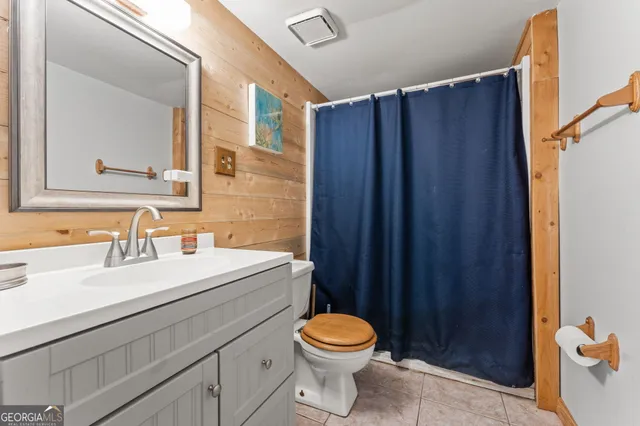 a house with swimming pool in front of it