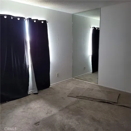 an empty room with closet