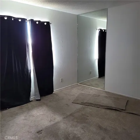 an empty room with closet