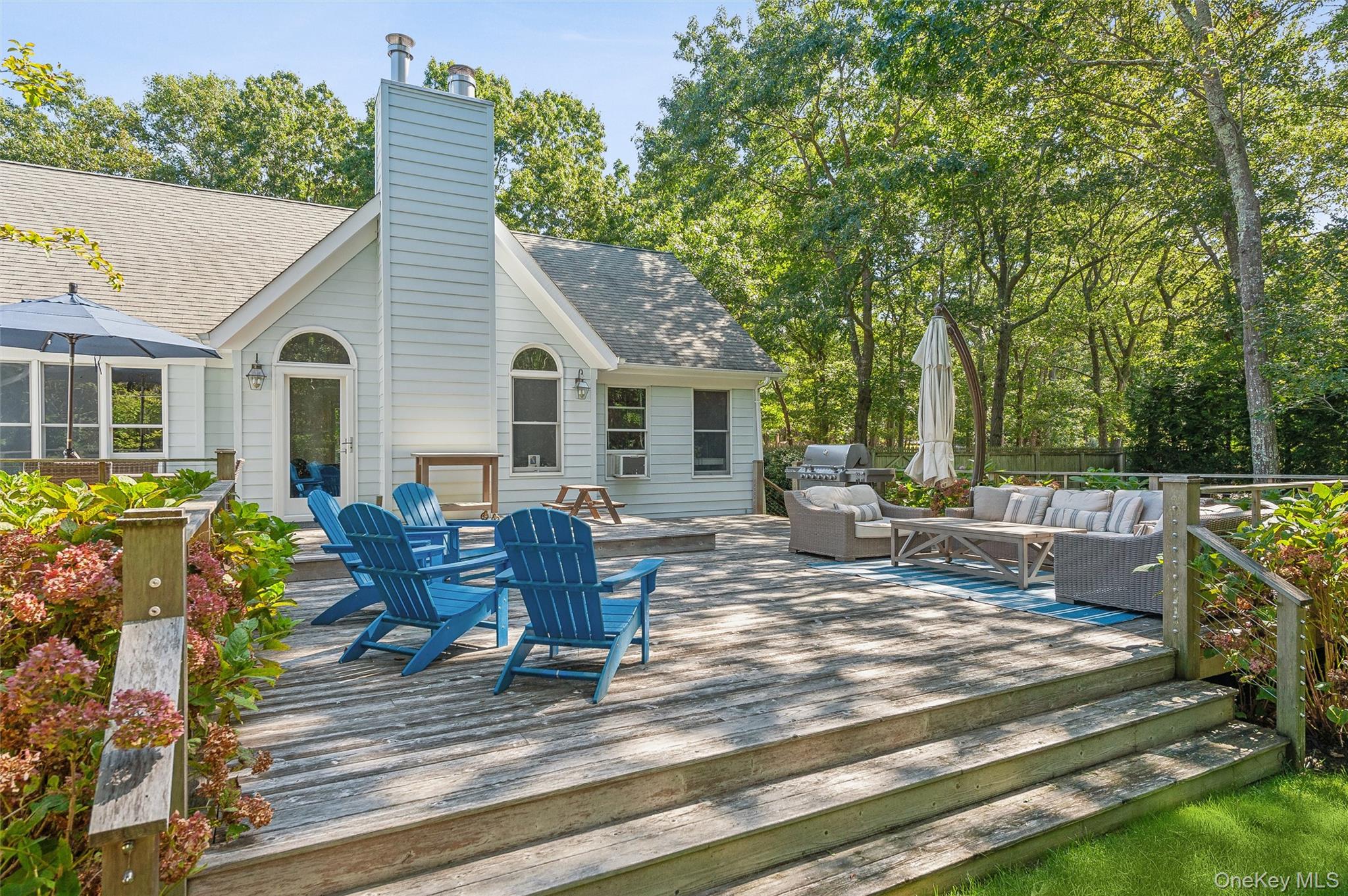 14 Hildreth Road Hampton Bays, NY 11946 - Photo 19 of 29 Wooden terrace featuring outdoor lounge area, and area for grilling