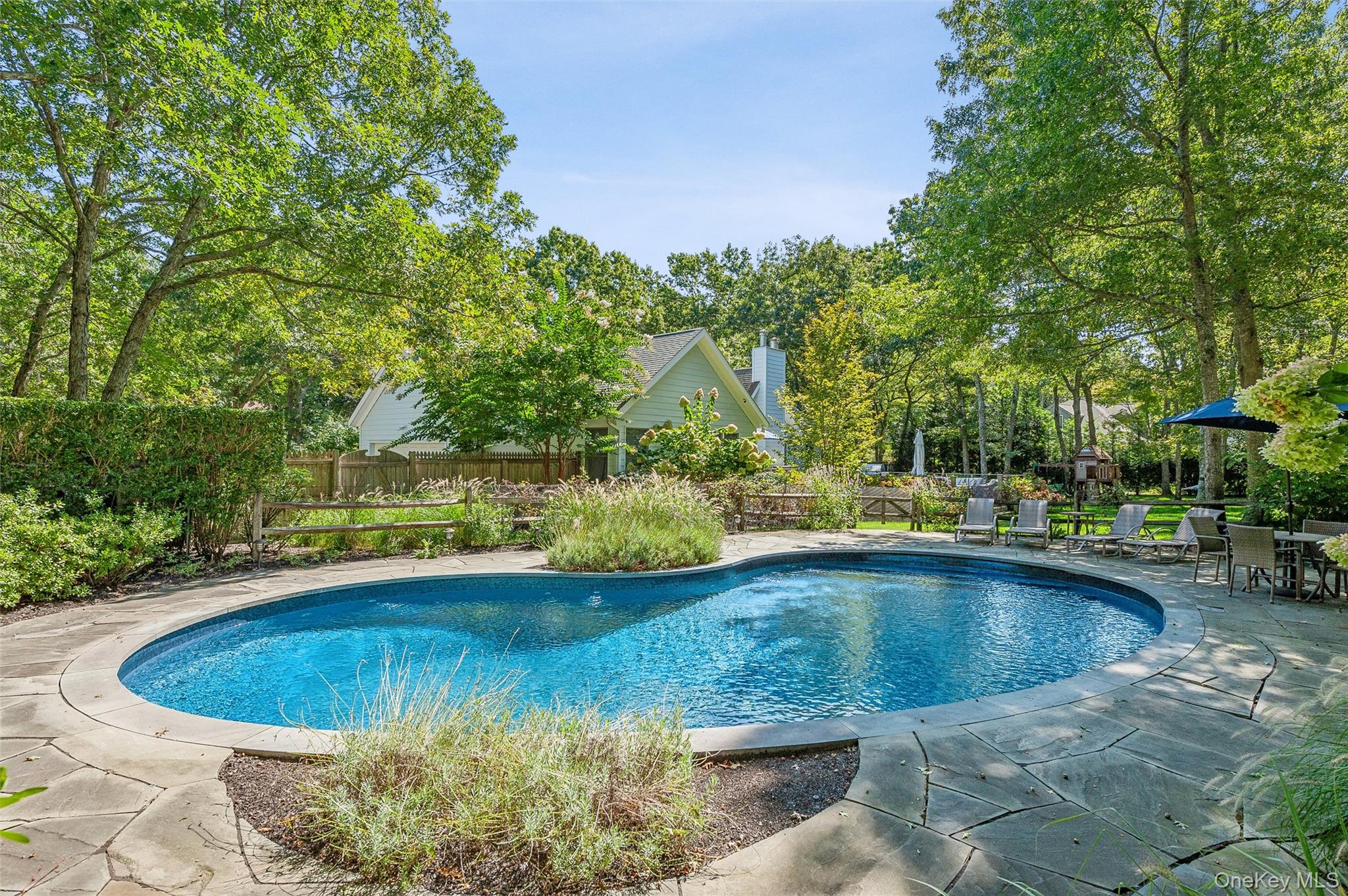 14 Hildreth Road Hampton Bays, NY 11946 - Photo 3 of 29 View of swimming pool featuring fence, a patio, and a fenced in pool