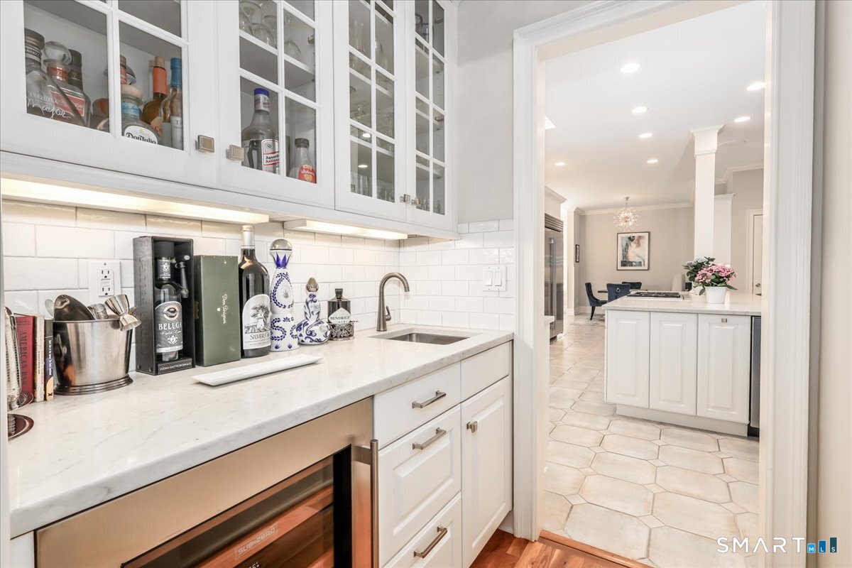 170 Branchville Road Ridgefield, CT 06877 - Photo 9 of 36 Wet Bar with subzero refrigerator, sink and plenty of storage