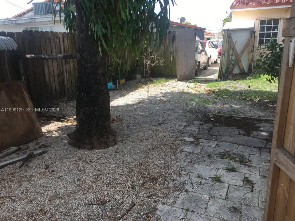 625 East 8th Court Hialeah, FL 33010 - Photo 14 of 18 a view of a backyard of the house