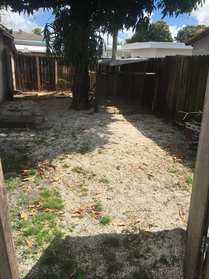 625 East 8th Court Hialeah, FL 33010 - Photo 15 of 18 a view of a backyard of the house