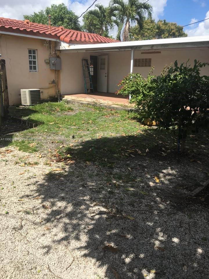 625 East 8th Court Hialeah, FL 33010 - Photo 18 of 18 a house view with a outdoor space