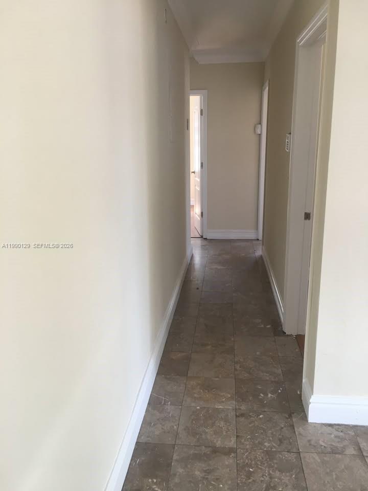 625 East 8th Court Hialeah, FL 33010 - Photo 7 of 18 a view of a hallway