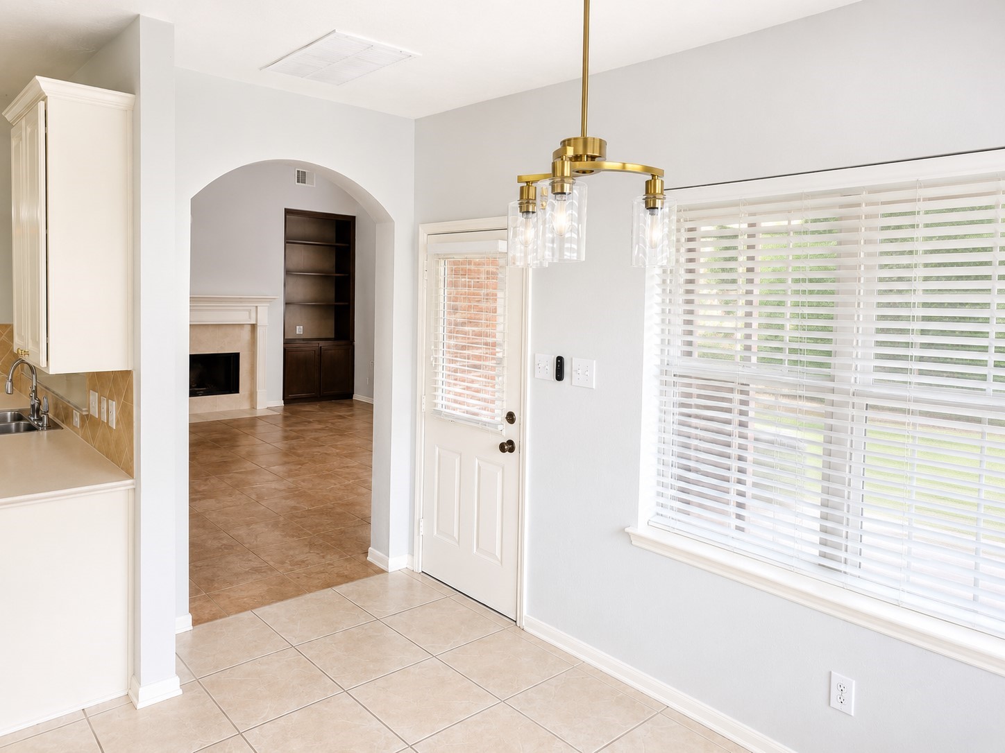 20203 Timberstone Lane Spring, TX 77379 - Photo 9 of 23 This casual dining space overlooks the backyard, creating a perfect spot for everyday meals with a view of the pool.