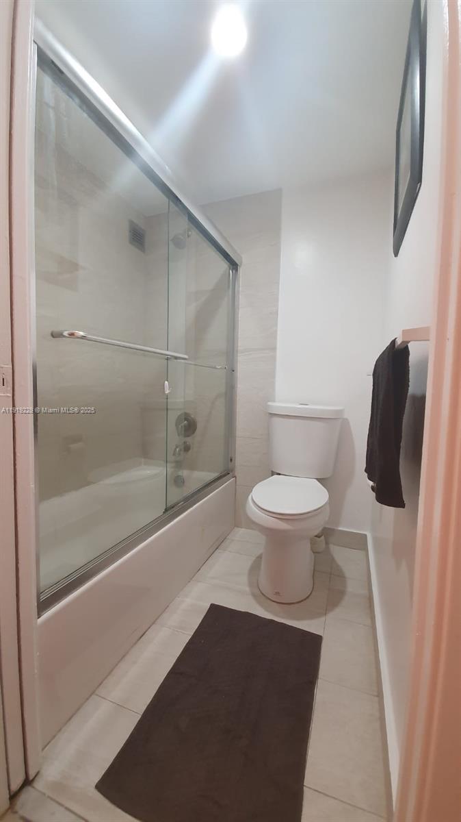 17021 North Bay Road, Unit 316 Sunny Isles Beach, FL 33160 - Photo 16 of 19 a bathroom with a toilet and a shower