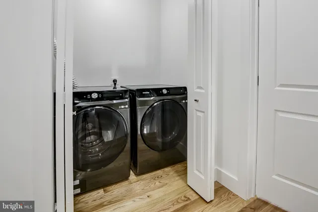 a utility room with dryer and washer