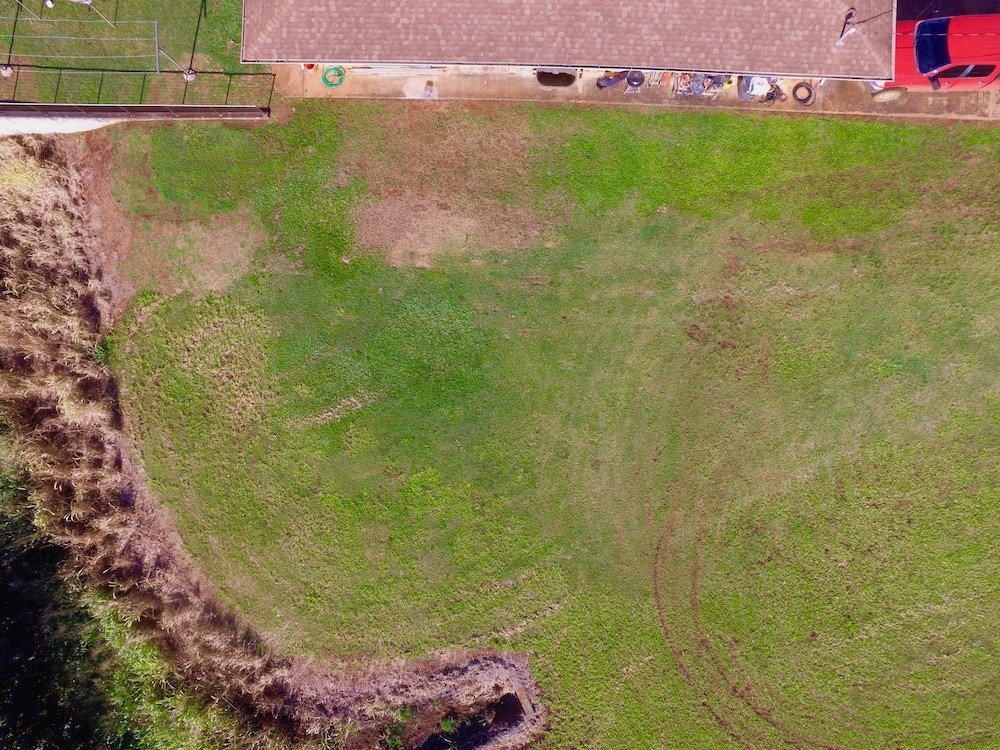 173 Eggerking Road Kapaa, HI 96746 - Photo 2 of 11 a view of a lake with a yard