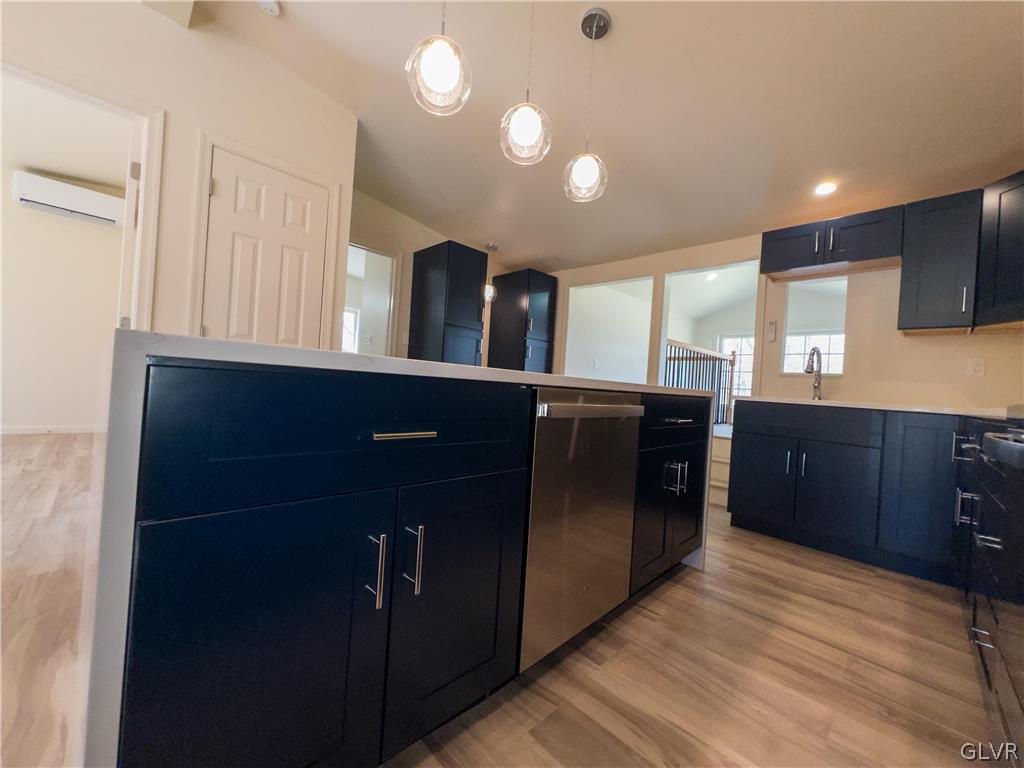 396 Swamp Road Wind Gap, PA 18091 - Photo 15 of 50 a kitchen with stainless steel appliances granite countertop a refrigerator and a sink
